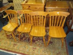 A SET OF FOUR MODERN PINE CHAIRS