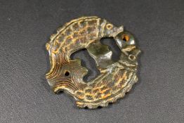 AN EARLY CHINESE JADE PENDANT WITH FISH DESIGN
