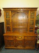 A MODERN OAK GOTHIC STYLE DRESSER H-196 W-157 CM