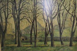 A FRAMED LITHOGRAPH ON BOARD OF A WOODED SCENE