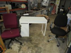 A MODERN DESK AND TWO OFFICE CHAIRS
