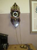 A REPRODUCTION DUTCH WALLCLOCK WITH BRASS WEIGHTS