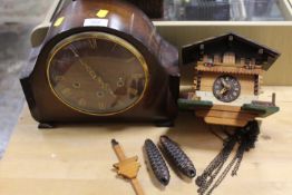 A VINTAGE WALL MOUNTED CUCKOO CLOCK TOGETHER WITH A VINTAGE MANTLE CLOCK (2)