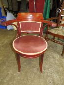A 20TH CENTURY OAK BENTWOOD ARMCHAIR
