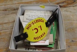 A QUANTITY OF VINTAGE RAILWAY EPHEMERA TO INCLUDE WAGON LABELS, ENAMEL ARM BAND ETC