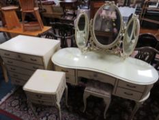 A LOUIS XV STYLE CREAM DRESSING TABLE, CHEST AND BEDSIDE CABINET, STOOL ETC (4)