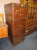 A VINTAGE WOODEN FOUR DRAWER FILING CHEST