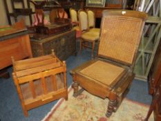 A VINTAGE COMMODE ARMCHAIR, AN OAK MAGAZINE RACK AND A DUMB WAITER (3)