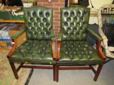 A PAIR OF REPRODUCTION GREEN LEATHER ARMCHAIRS