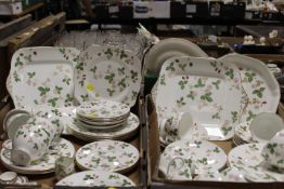TWO TRAYS OF WEDGWOOD WILD STRAWBERRY PATTERN TEA AND DINNERWARE TO INCLUDE A SELECTION OF