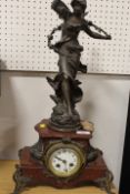 A FIGURAL FRENCH MARBLE MANTLE CLOCK WITH GILT EMBELLISHMENTS