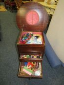 A VINTAGE SEWING BOX / TABLE WITH CONTENTS