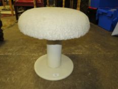 A RETRO WHITE STOOL