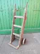 A VINTAGE WOODEN RAILWAY SACK TRUCK / LUGGAGE TROLLEY