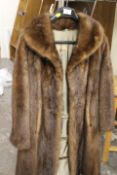 A VINTAGE THREE QUARTER LENGTH MINK FUR COAT - MADE EXPRESSIVELY FOR CAIRDS