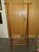 A MODERN FOLDING WOODEN CLOTHES RAIL