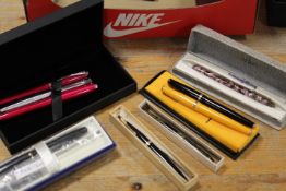 A COLLECTION OF PENS AND WRITING IMPLEMENTS TO INCLUDE PARKER