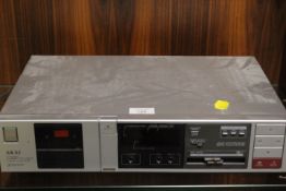 AN AKAI STEREO CASSETTE DECK