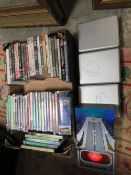 A TRAY CONTAINING A SELECTION OF NEW AND SEALED DVDS, RAILWAY THEMED DVDS AND FOUR STAR TREK BOX