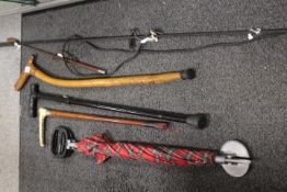 A COLLECTION OF VINTAGE STICKS, UMBRELLA, SHOOTING STICK ETC