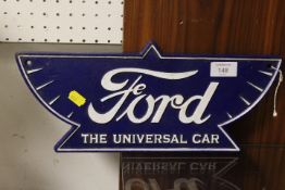 A MODERN REPRODUCTION CAST METAL FORD PLAQUE