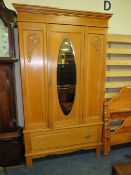 AN EDWARDIAN SATINWOOD WARDROBE