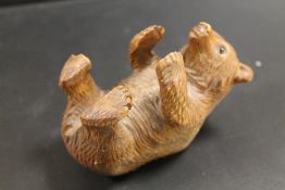 A CARVED BLACK FOREST STYLE BEAR