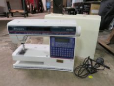 A HUSQVARNA VIKING ELECTRIC SEWING MACHINE ( LILY-555)