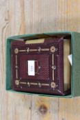 A LEATHER BOUND VICTORIAN PHOTOGRAPH ALBUM