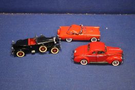 THREE DANBURY MINT CARS TO INCLUDE RED FORD THUNDERBIRD, RED FORD DE-LUXE COOPE AND A BLACK HAWK