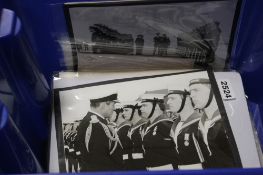 A TRAY OF PHOTOGRAPHS AND POSTCARDS MAINLY MILITARY TYPE EXAMPLES