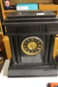 A LARGE SLATE MANTLE CLOCK