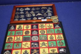 TWO TRAYS OF MILITARY TYPE CAP BADGES