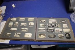 A PHOTOGRAPH ALBUM CONTAINING PHOTOGRAPHS OF BUILDINGS, SEASCAPES ETC