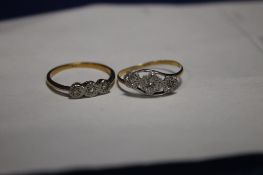 TWO DIAMOND SET YELLOW METAL RINGS SIZE M AND L