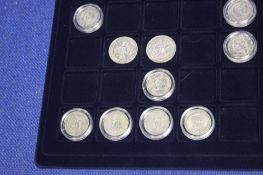 A CASE OF ASSORTED COINS