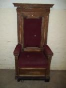 AN ANTIQUE SOLID OAK THRONE CHAIR