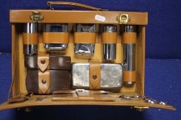 A CASED GENTLEMANS TRAVEL SET