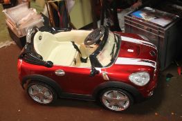 A CHILD'S BATTERY POWERED MINI