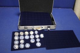 A CASE CONTAINING A SELECTION OF SILVER PROOF COINS