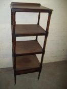 AN ANTIQUE WOT NOT STAND WITH LIFT UP TOP