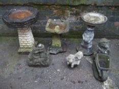 A SELECTION OF CONCRETE STATUES AND BIRD BATHS