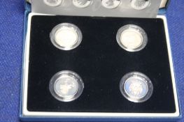 2004, SILVER PROOF £1 COIN, SET OF FOUR IN CASE OF ISSUE WITH COA