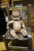 A VINTAGE CHILDS CHAIR TOGETHER WITH A DOLL