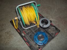 A HOZELOCK GARDEN PIPE AND 2 ELECTRIC EXTENSION LEADS