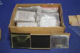 A BOX OF GLASS SLIDES