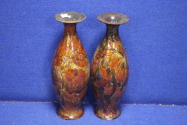 A PAIR OF ROYAL DOULTON VASES 1 A/F