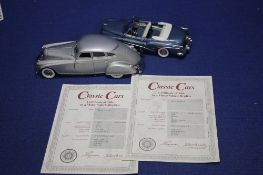 A PAIR OF DAMBURY MINT CARS TO INCLUDE BLUE SKYLARK AND SILVER ARROW BOTH WITH CERTIFICATES