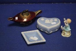 A ROYAL WORCESTER FIGURINE 