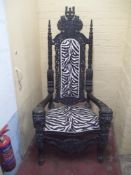 A MODERN THRONE CHAIR WITH ZEBRA MARKINGS